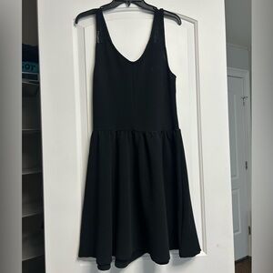 black dress with lace detailing on straps and back